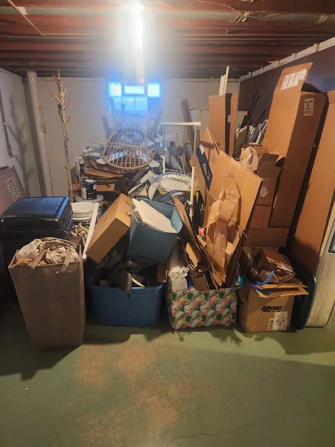 Roll-off dumpster container at job site for 4 Yard Dumpster Rental in Beaufort